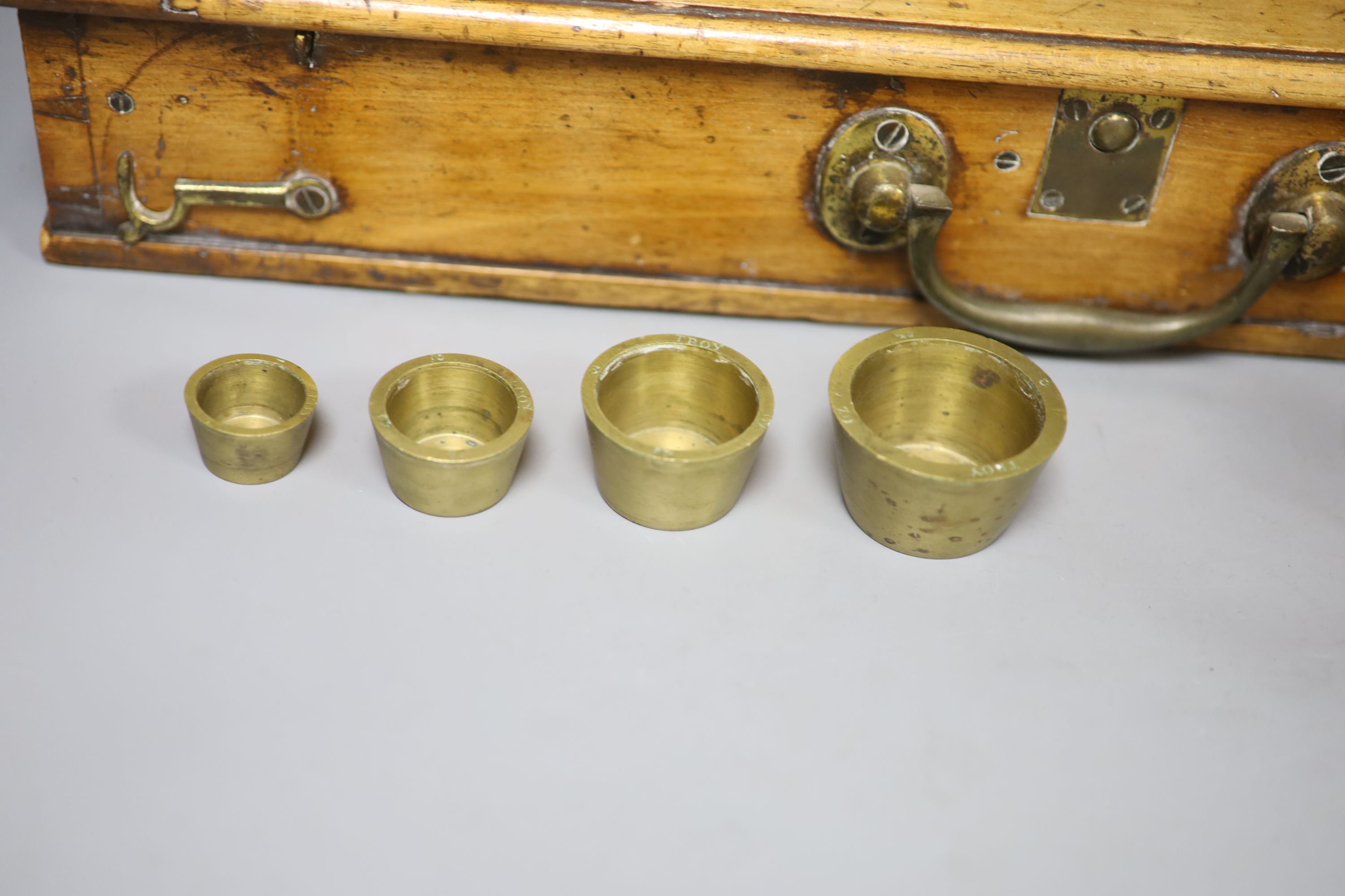 A set of mahogany brass scales by De Crave, Short Fanner & Co., width 50cm. height 70cm.